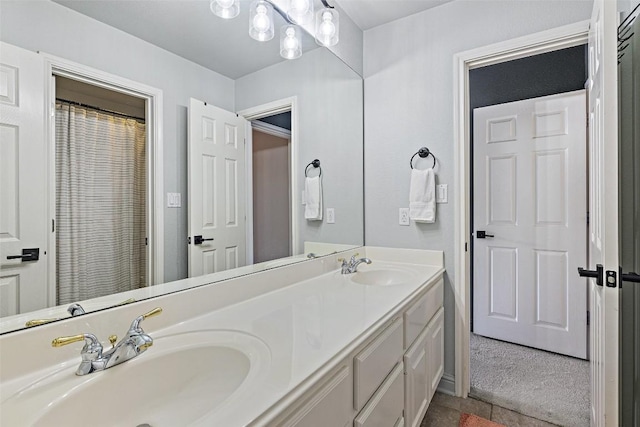 bathroom with double vanity and a sink