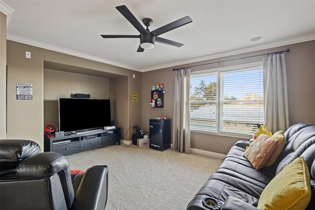 living area with crown molding, baseboards, a ceiling fan, and light colored carpet