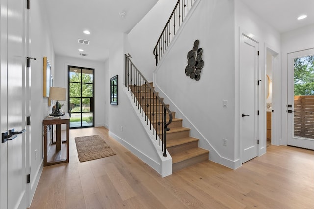 entrance foyer with light wood-type flooring