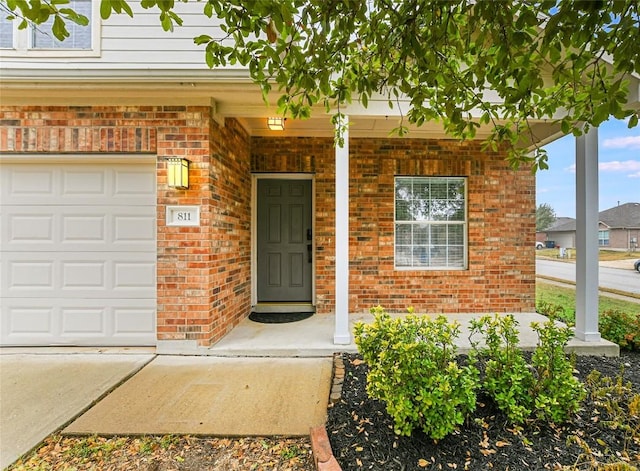 doorway to property with covered porch