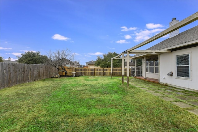 view of yard featuring a sunroom