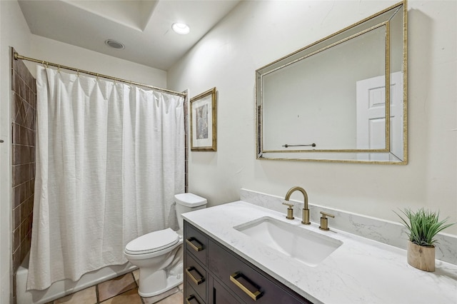 full bathroom featuring vanity, shower / tub combo, and toilet