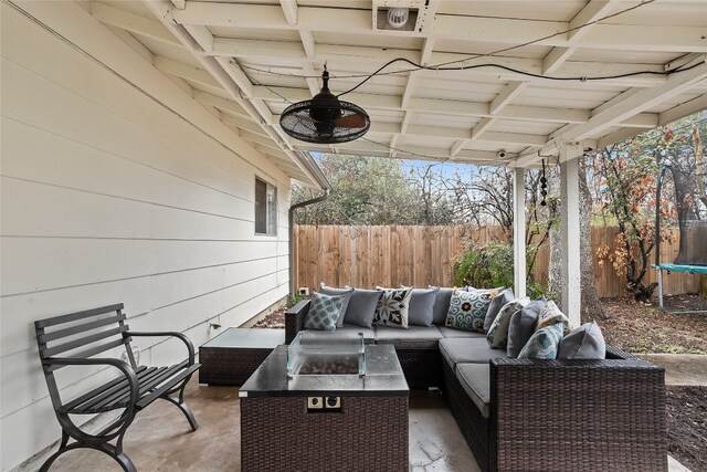 view of patio with ceiling fan and outdoor lounge area