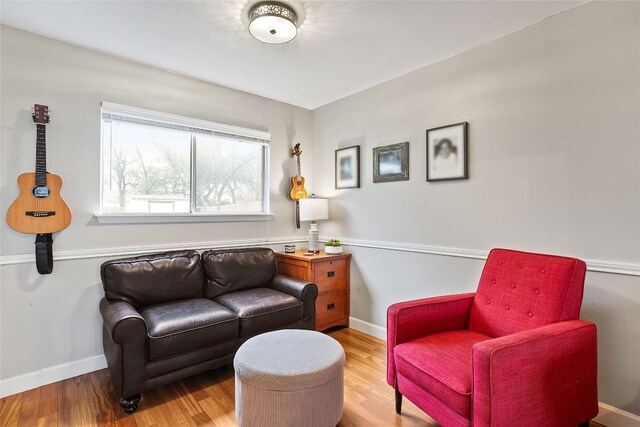 sitting room with light hardwood / wood-style flooring