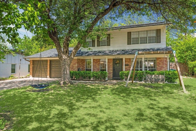 2502 Spruceleaf Cir, Austin, TX 78757 - traditional-style home featuring a garage, driveway, and brick siding