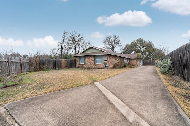 view of front of home with a front lawn