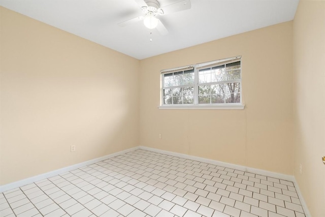 spare room with ceiling fan