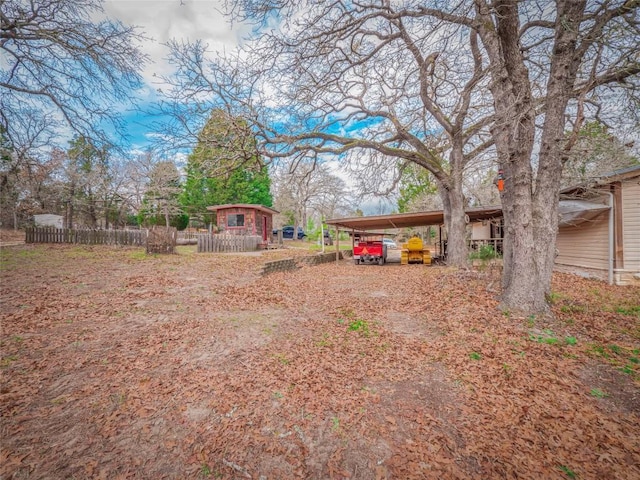 view of yard with a carport