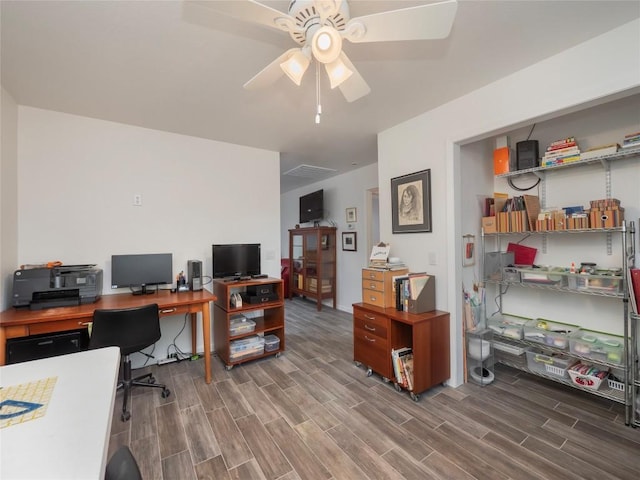 office area with ceiling fan