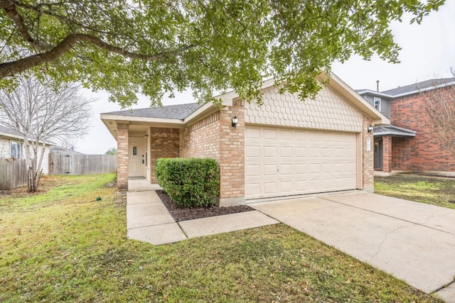 ranch-style home with a garage and a front yard