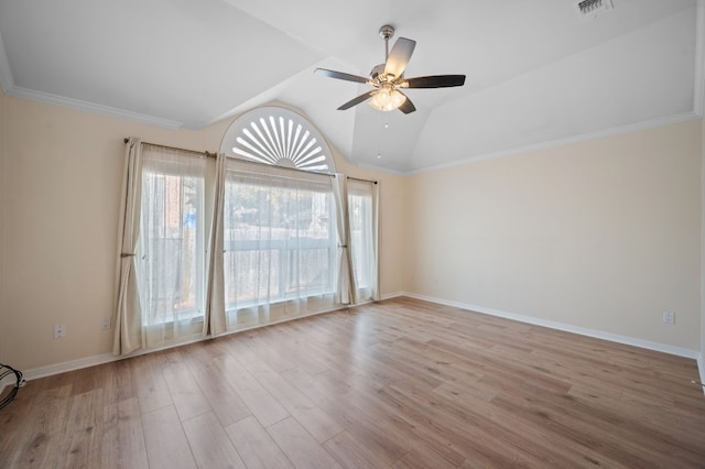 spare room with lofted ceiling, light hardwood / wood-style flooring, and ceiling fan