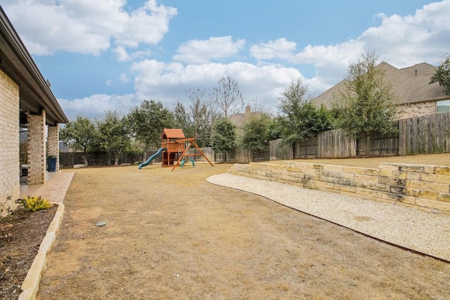 view of yard featuring a playground