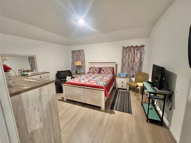 bedroom featuring light wood-type flooring