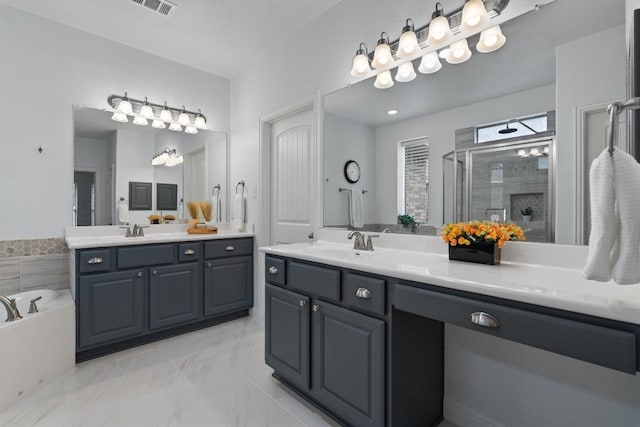 bathroom featuring shower with separate bathtub and vanity