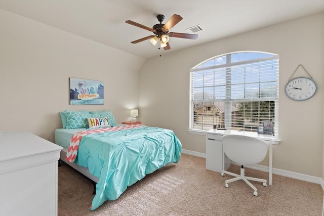 bedroom with ceiling fan and light carpet