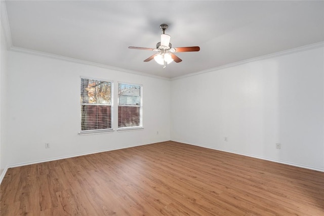 unfurnished room featuring ornamental molding, ceiling fan, and light hardwood / wood-style floors