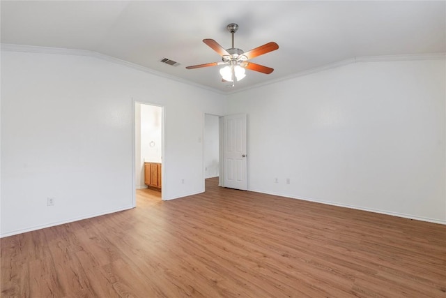 interior space with lofted ceiling, ornamental molding, light hardwood / wood-style floors, and ceiling fan