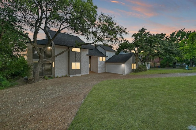 view of front of house with a yard