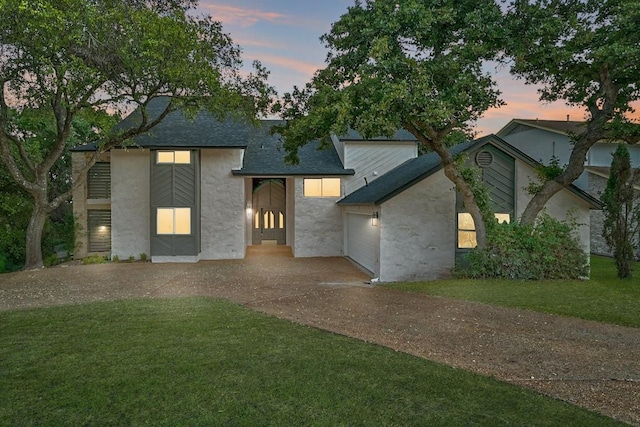 view of front of house with a lawn