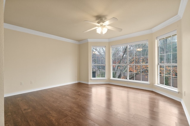 unfurnished room with hardwood / wood-style floors, ornamental molding, and ceiling fan