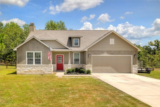 view of front of home with a garage, stone siding, concrete driveway, and a front yard