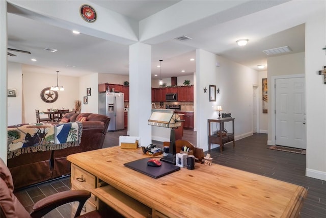 254 Cardinal Loop, Paige, TX 78659 - dining area with dark wood-style floors, baseboards, recessed lighting, ceiling fan, and a chandelier