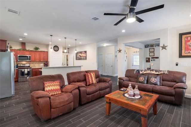 254 Cardinal Loop, Paige, TX 78659 - living area with wood finish floors, a ceiling fan, recessed lighting, and baseboards