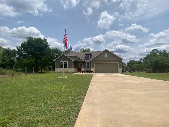 254 Cardinal Loop, Paige, TX 78659 - craftsman inspired home featuring concrete driveway, a garage, and a front yard