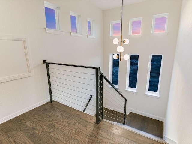 staircase featuring hardwood / wood-style flooring