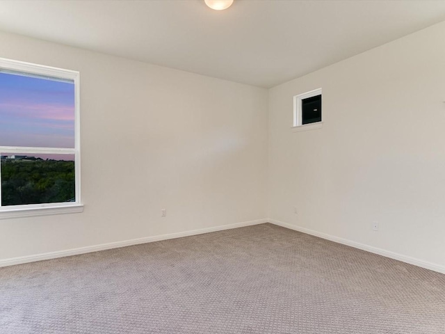 view of carpeted spare room