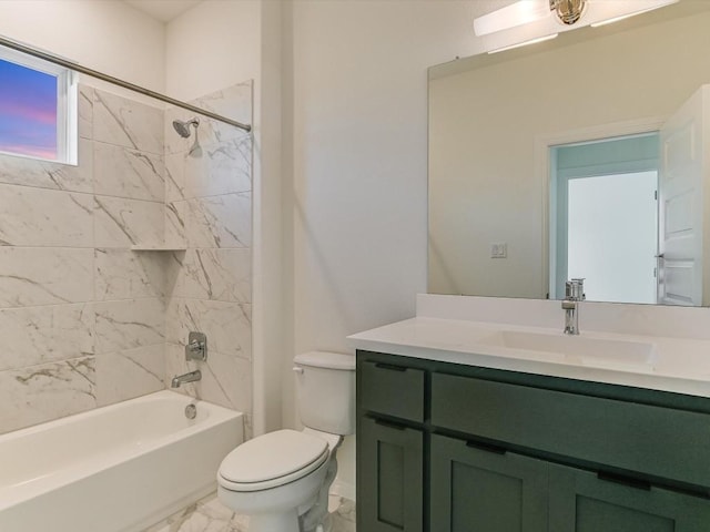 full bathroom with vanity, toilet, and tiled shower / bath combo