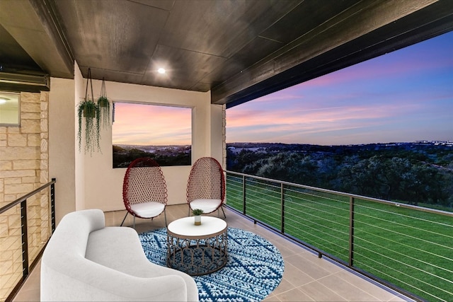 view of balcony at dusk