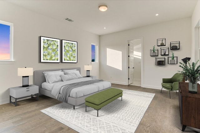 bedroom featuring wood-type flooring