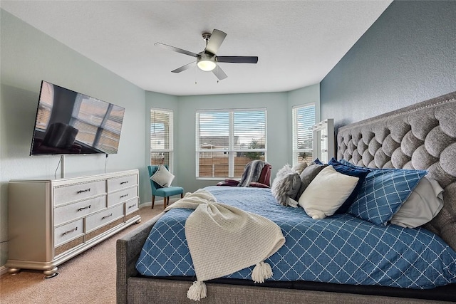 19405 Colgin Dr, Pflugerville, TX 78660 - carpeted bedroom with a ceiling fan and baseboards