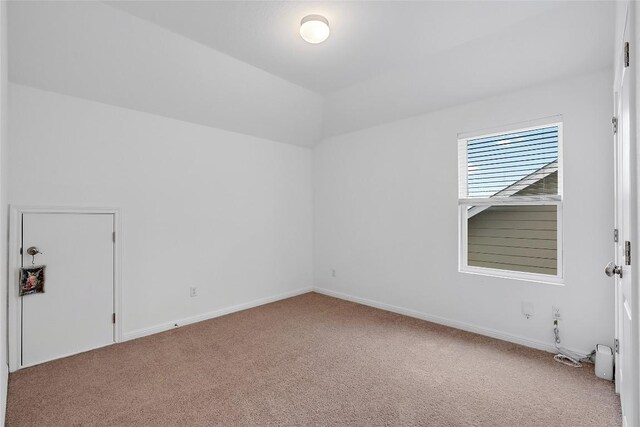 19405 Colgin Dr, Pflugerville, TX 78660 - unfurnished room featuring carpet flooring and lofted ceiling