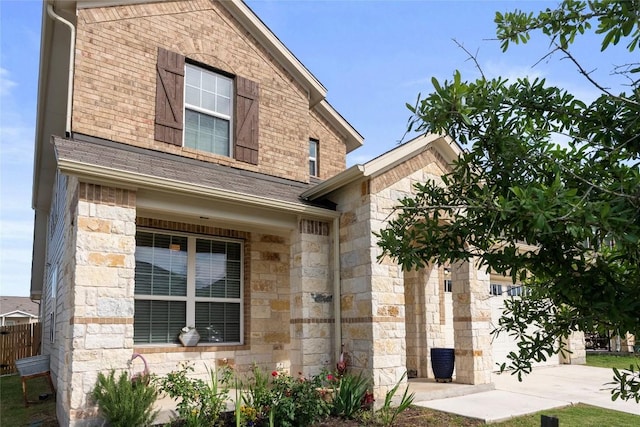 19405 Colgin Dr, Pflugerville, TX 78660 - view of front of house featuring stone siding