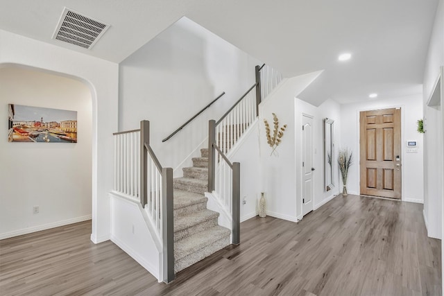 entryway with light hardwood / wood-style floors