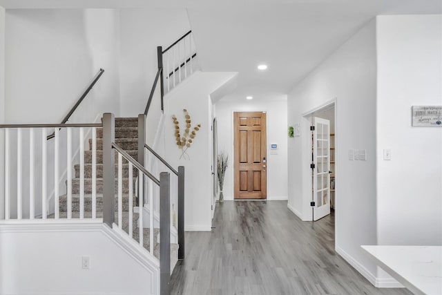 foyer entrance featuring light hardwood / wood-style floors