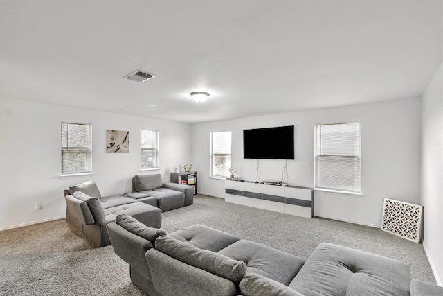 living room featuring light carpet