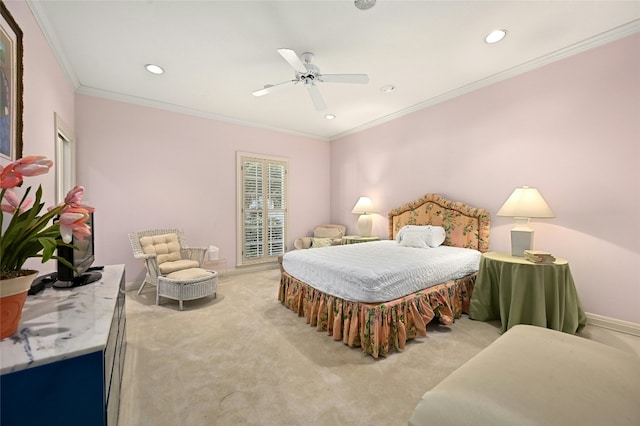 bedroom featuring ornamental molding, carpet flooring, and ceiling fan