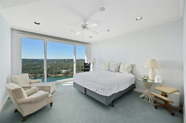 bedroom featuring a water view, ceiling fan, ornamental molding, and carpet flooring