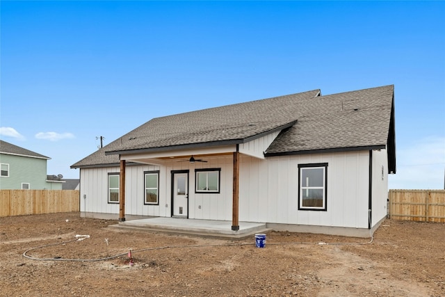 rear view of property with a patio area and ceiling fan