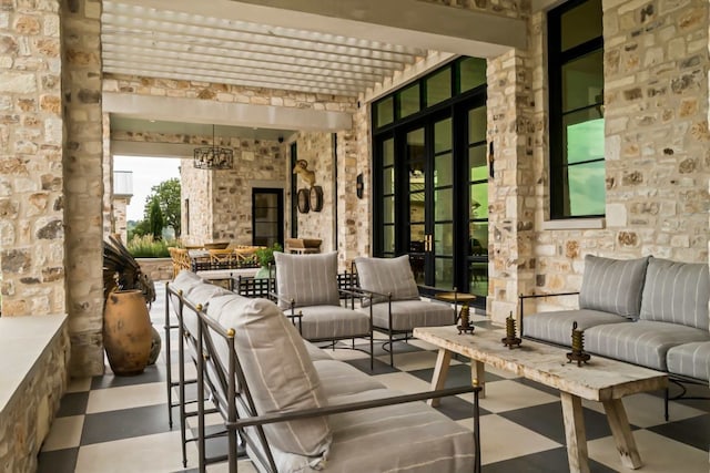 view of patio featuring outdoor lounge area and a pergola