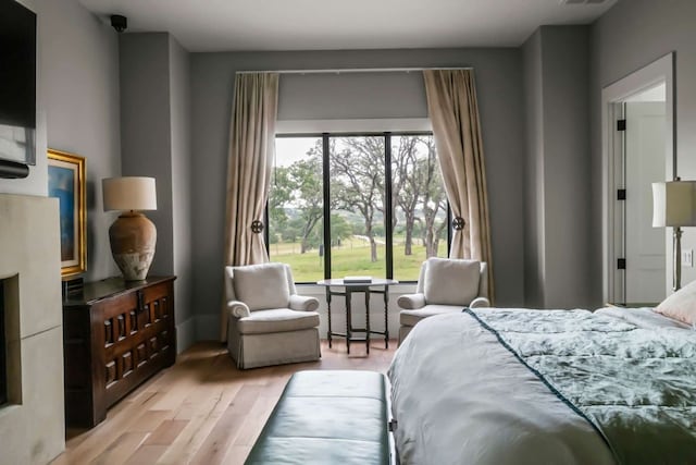 bedroom with light wood-type flooring