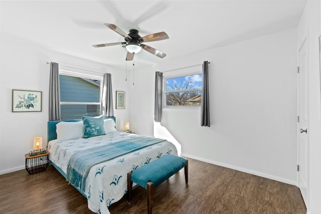 bedroom featuring dark hardwood / wood-style flooring and ceiling fan