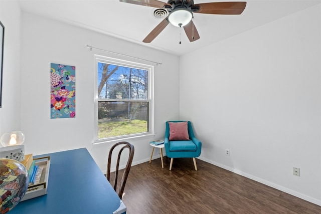 home office with dark hardwood / wood-style floors and ceiling fan