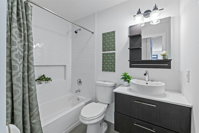 full bathroom featuring vanity, shower / bath combination with curtain, and toilet