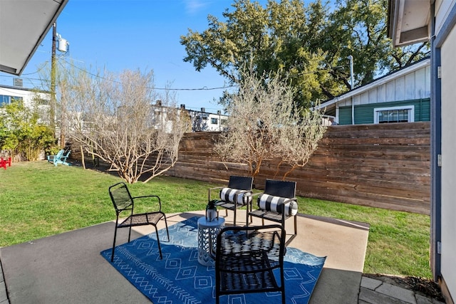 view of patio / terrace featuring outdoor lounge area and a fenced backyard