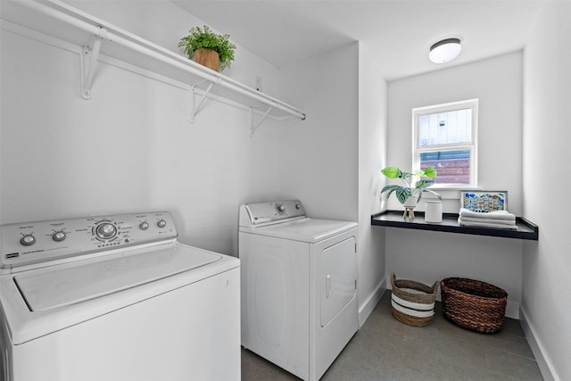 clothes washing area featuring washing machine and dryer