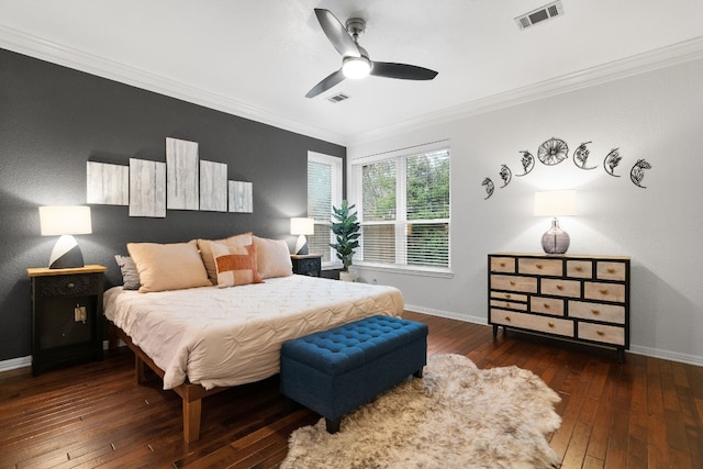 bedroom featuring crown molding, ceiling fan, and dark hardwood / wood-style flooring